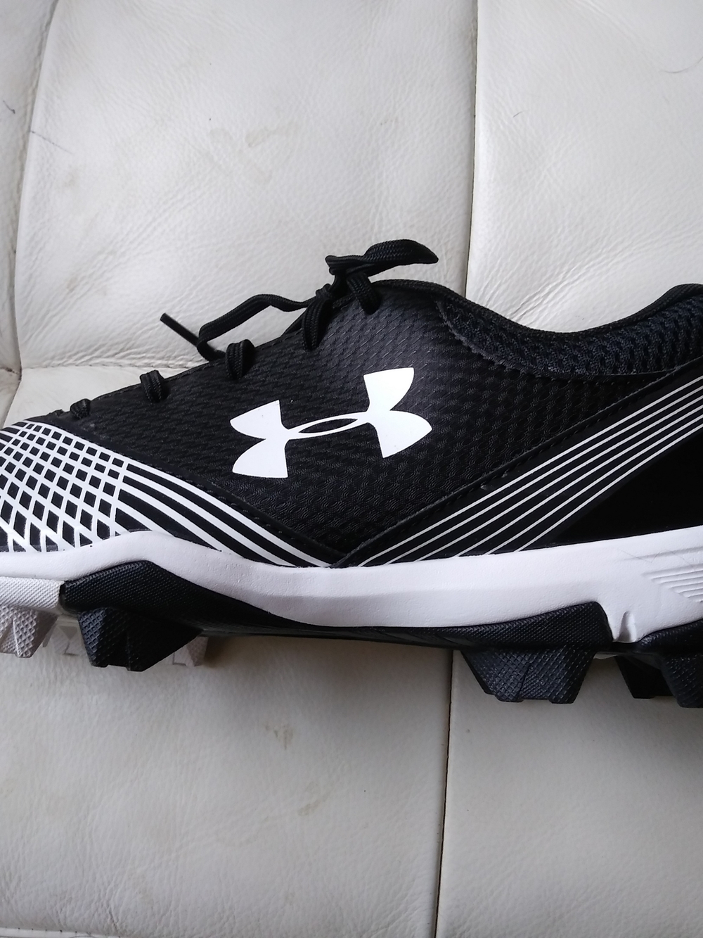 Under Armour Black and White Athletic Cleats